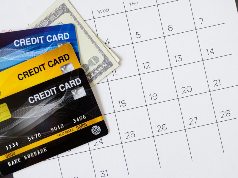 Calendar with days and Credit card on table. shopping concept